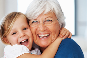 Young Girl and Elderly Woman Smiling